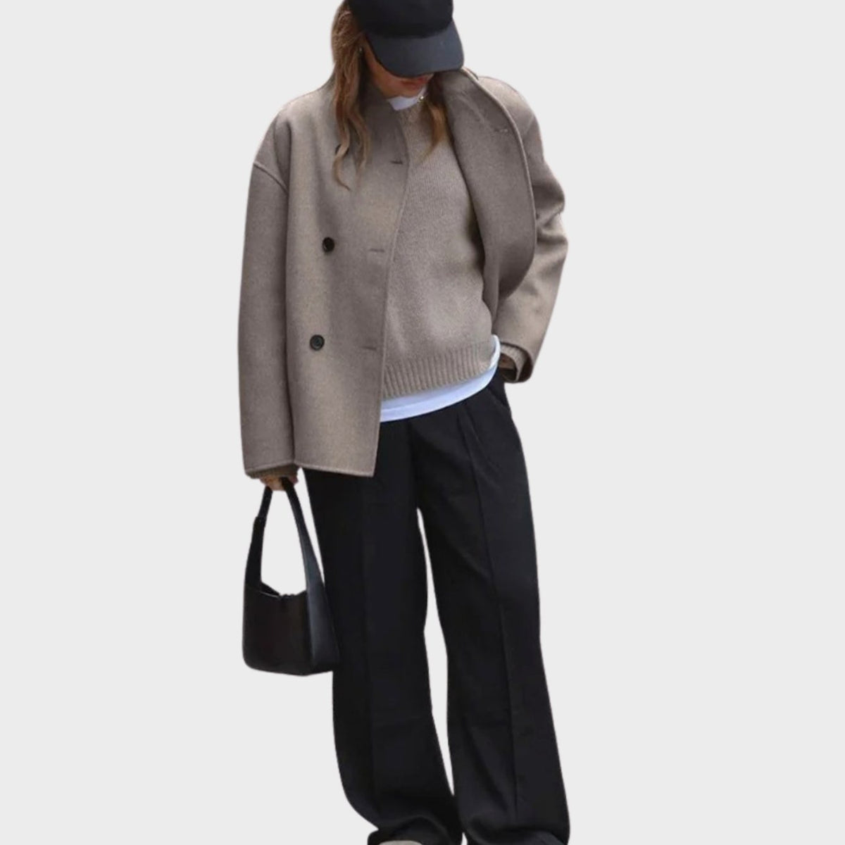 Vista frontal del abrigo marrón con escote en V y mangas largas