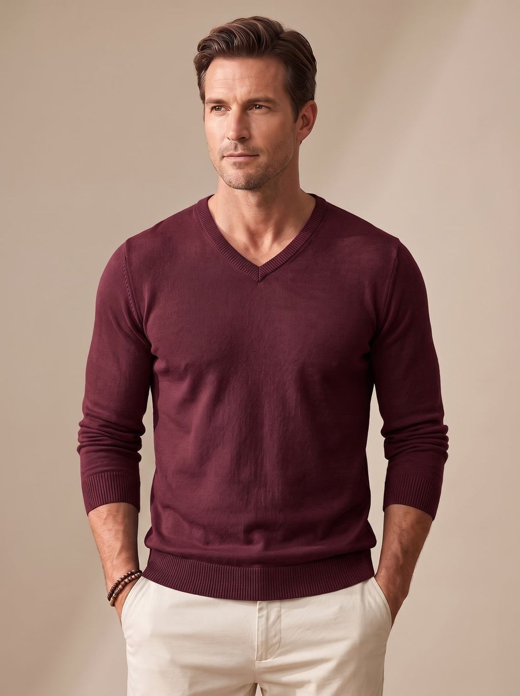 Jersey de punto fino en color blanco con cuello pico